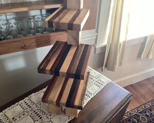 Tiered shelving system with six different woods